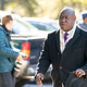 BRUNSWICK, GA - NOVEMBER 24: Attorney Ben Crump walks outside the Glynn County Courthouse as the jury deliberates in the trial of the killers of Ahmaud Arbery on November 24, 2021 in Brunswick, Georgia. Crump, who represented the families of many Black people gunned down by police, has been retained by the family of a New Jersey teenager who was restrained by cops who let a white teen involved in the same fight sit on a mall bench.